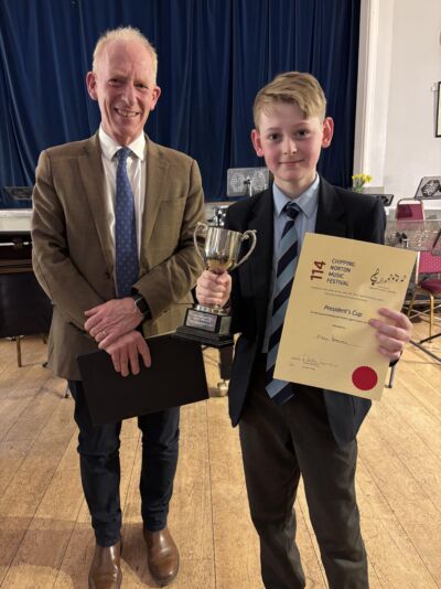 Ethan Barnard receiving the Presidents Cup.