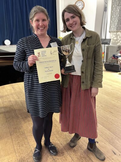 Vicky Pike receiving the Catherine Harrison Cup on behalf of St Mary’s Year 4